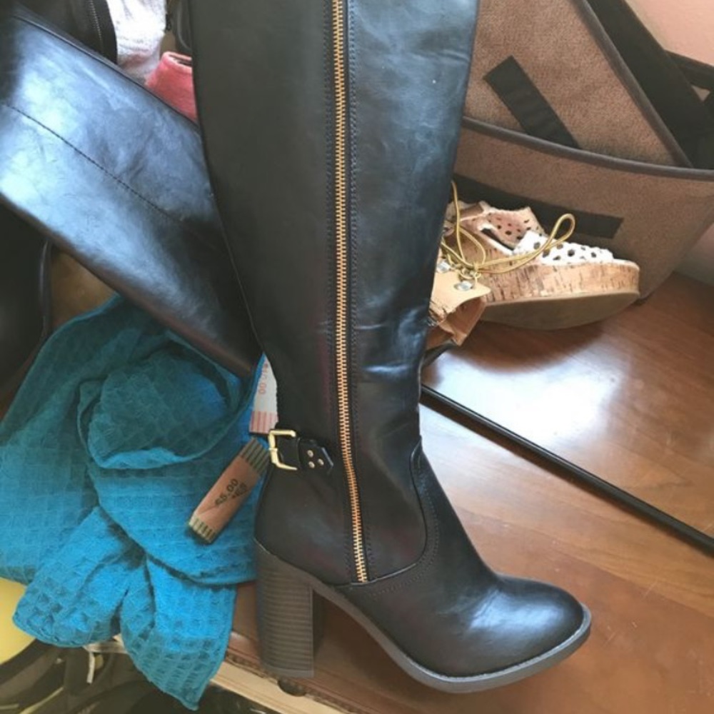 Healed knee high boots.